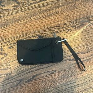 Athleta “Coffee Run Clutch” wallet in “animal black”